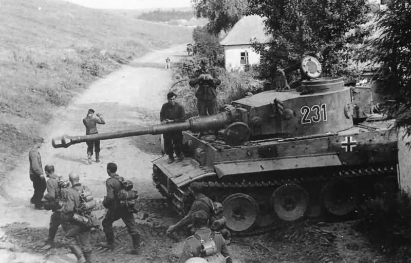 This is Tiger 231. I don't know the unit it is a part of, but I think it's probably on the Eastern front during 1942 or early 1943 (It appears an Ausf. H or H1, notice the commander's cupola).