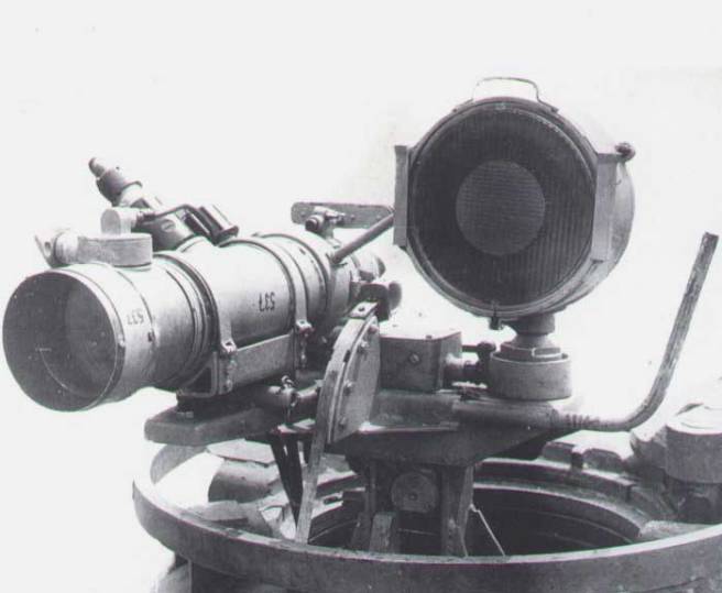 A late-World War II German infrared night-vision device with an illuminator spotlight. It seems to be mounted on a Panther's commander's cupola. While limited in range and offering a poor image, it represents some of the first steps towards improving tank crew's ability to operate with extended sensory equipment.